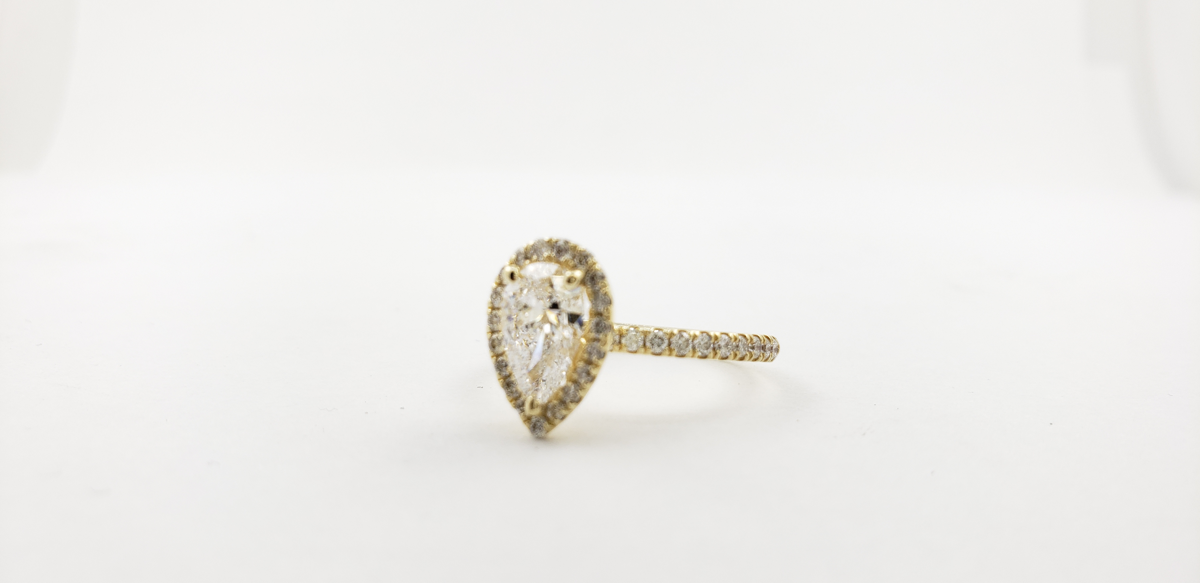 Pear Shape Diamond Ring with Halo